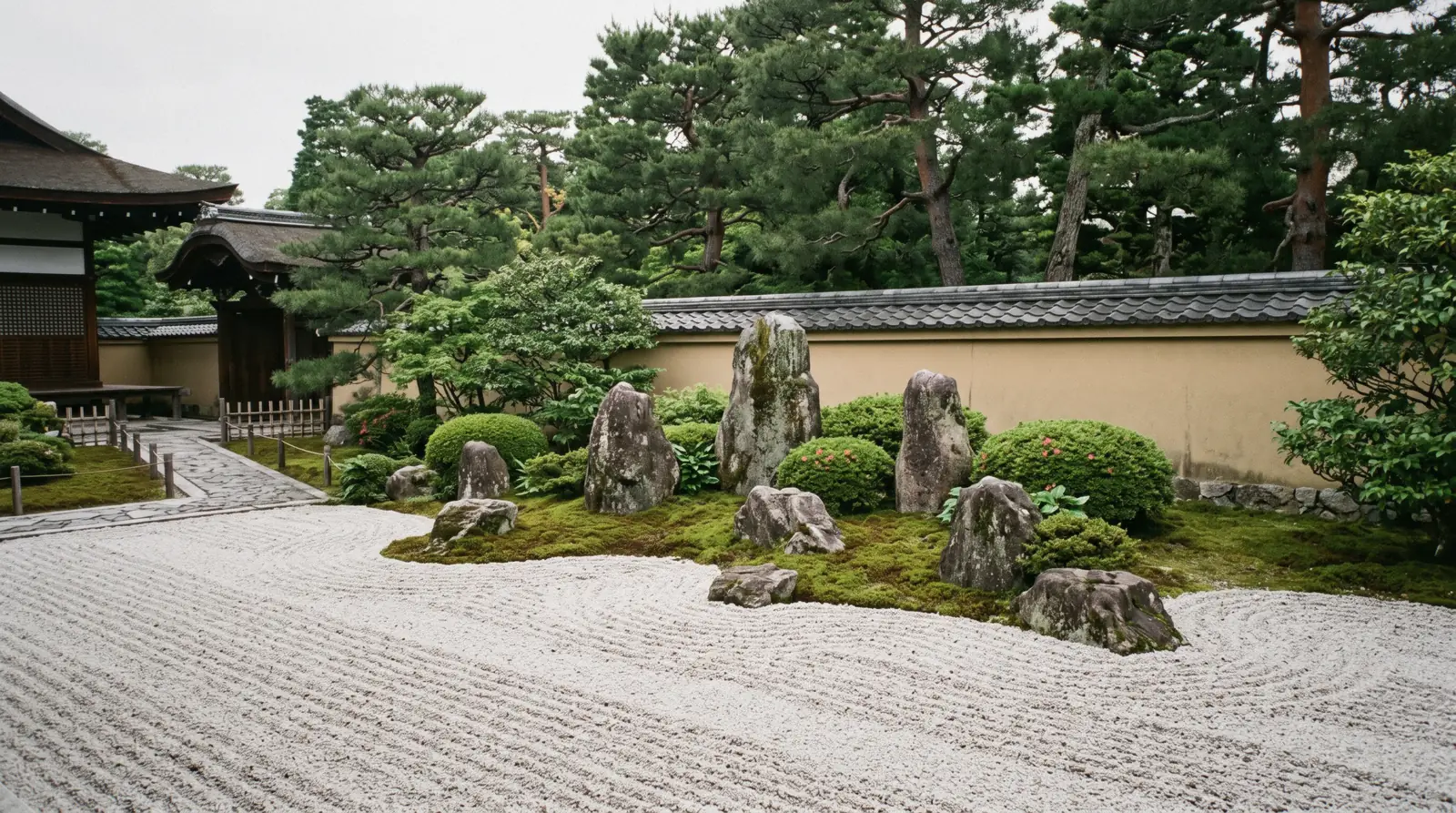 Raked gravel, moss and clipped shrubs in a temple garden under soft morning light, Kyoto gardens Japan